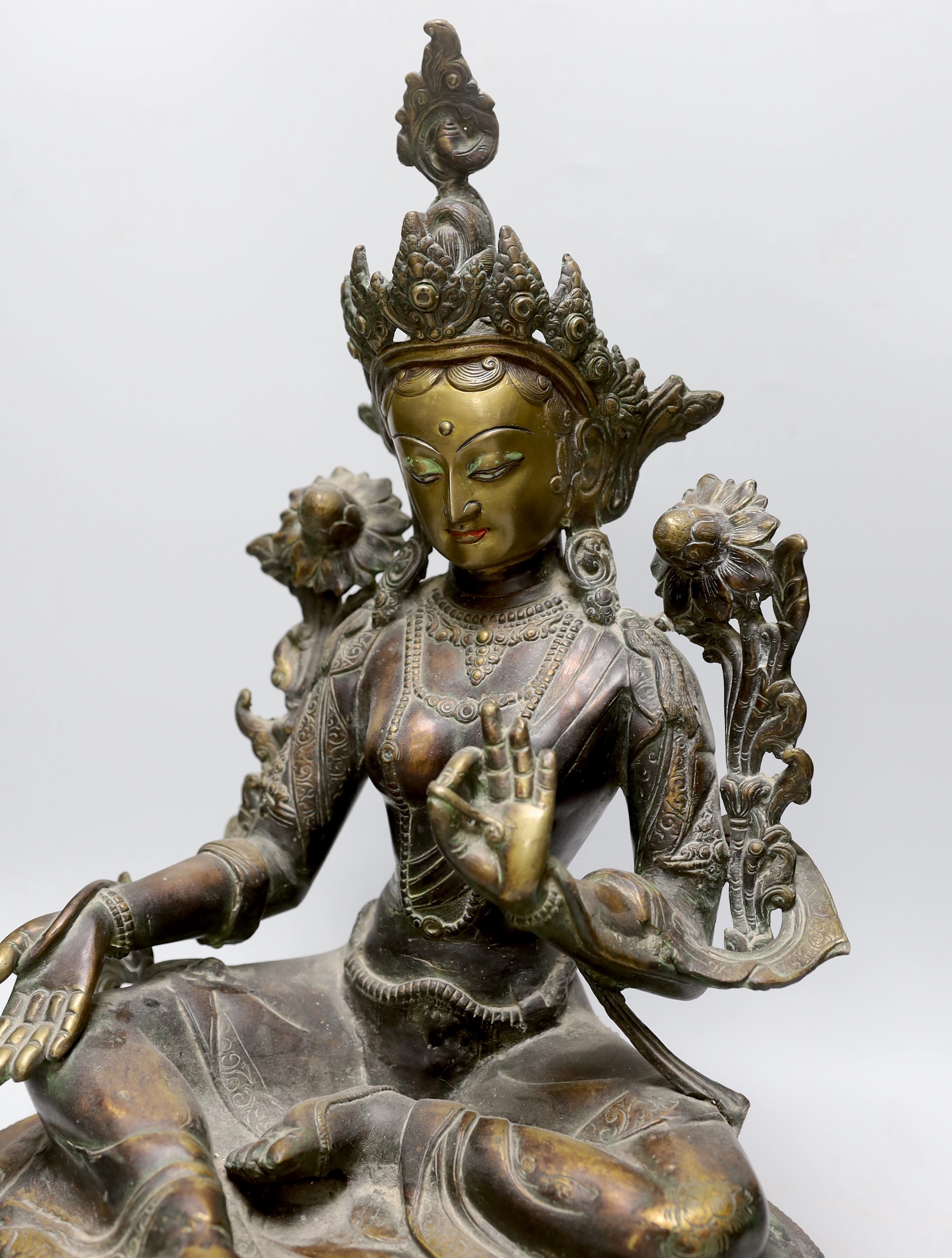 A large Sino-Tibetan bronze of Green Tara, 49cm high